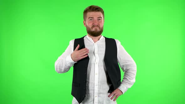 Man Is Proud of Himself, Showing His Hands That He's Good. Green Screen