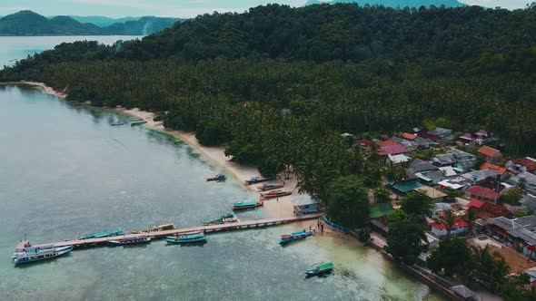 Pier with at Lampung Sea Pahawang Beach, located near the Sumatera city
