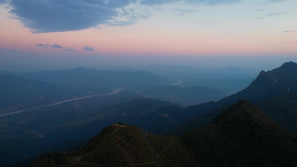 4K Aerial view from drone, amazing sunlight on high mountain peak.