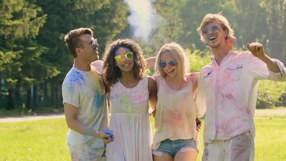 Young Excited People Hanging Out at Color Festival Holi, Extra-Slow Motion