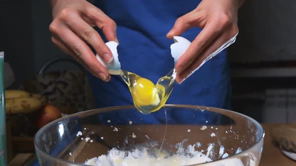 Hand Breaking Egg For Cooking