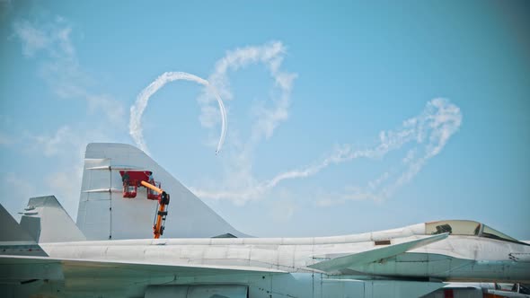 Reactive Planes Flying in the Sky and Performing the Show with Leaving Smoke Lines - People Painting