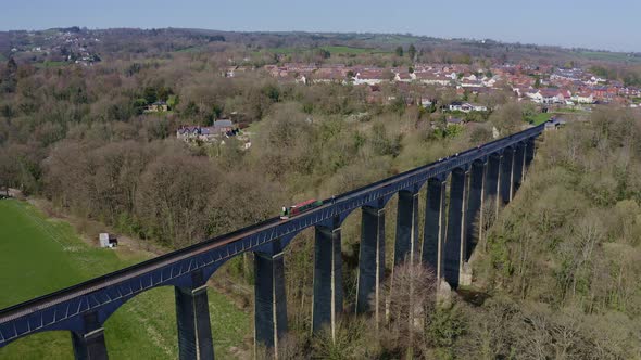 A Narrow Boat Crossing the Pontcysyllte Aqueduct famously designed by Thomas Telford,  located in th