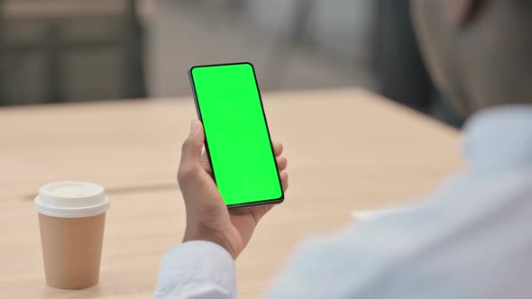 African Businessman Using Smartphone with Chroma Screen