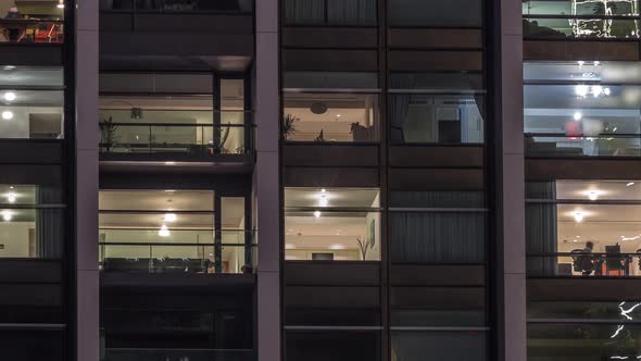 Big Glowing Windows in Modern Office and Residential Buildings Timelapse at Night