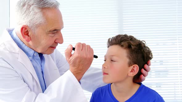 Male doctor examining a patient