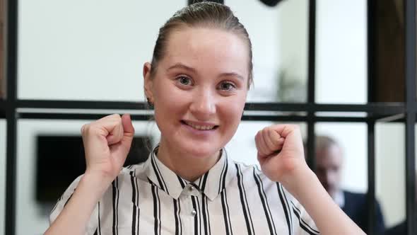 Woman Cheering, Celebrating Success, Office