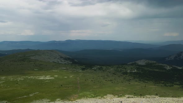 View from the mountain to the green valley