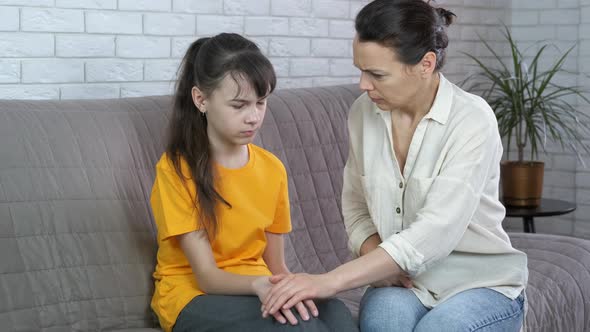 Depressed child with mother.