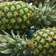 Halves of Unpeeled Pineapples on the Table - VideoHive Item for Sale