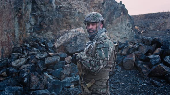 Soldier Man in Full Outfit Walking in the Field