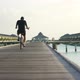 Cyclist On Bicycle Drive on Tropical Island with Water Villas - VideoHive Item for Sale