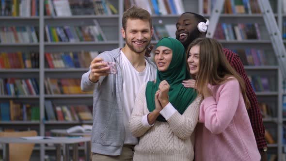 Diverse Students Taking Selfie Portrait in Library