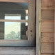 Woman looking out of window and waving - VideoHive Item for Sale