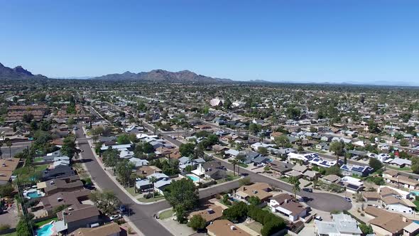 Drone footage of Scottsdale, Arizona view toward the distinctive architecture? of St. Maria Goretti