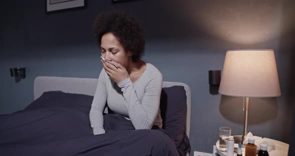 Black Female Coughing in Morning