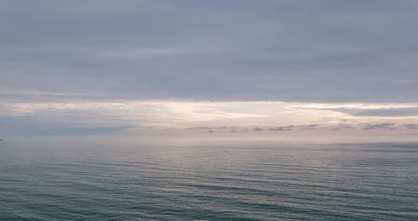 Romantic colorful sunset at the sea. Against the background of the sea, the sun goes down