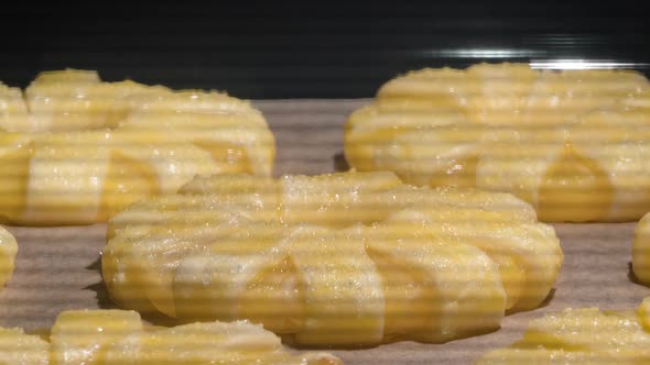 Time Lapse of Baking of Pineapple Puff Pastry Rings in Oven