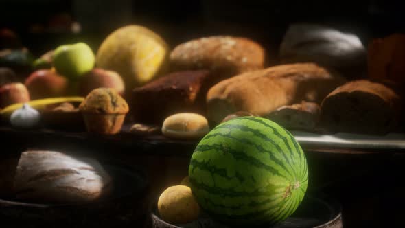 Food Table with Wine Barrels and Some Fruits, Vegetables and Bread alt