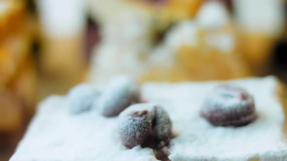 Pieces of Different Cakes on a Retrostyle Baking Tray