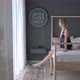 Beautiful Blonde Gets Out Of Bed And Pulls Out The Curtains. Sun Shines On Her From The Big Window - VideoHive Item for Sale