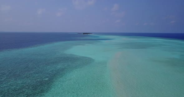 Tropical flying island view of a sunshine white sandy paradise beach and aqua turquoise water backgr