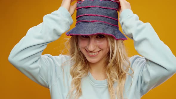 Happy Young Joyful Woman Portrait Smiling Against Yellow Background