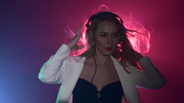 Sexy Blonde Dj Girl Playing and Listening To Music, Putting Headphones, Smoke, Silhouette, Pink