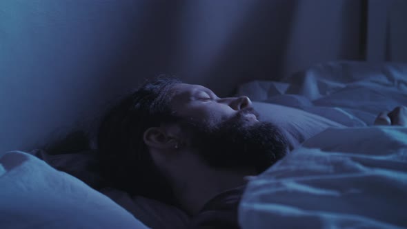 Sleep Disorder Night Terror Disturbed Man in Bed