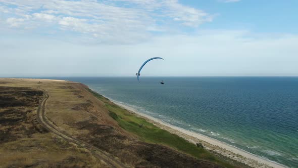 Beautiful View on the Sea and People Paragliding, Extreme Sports