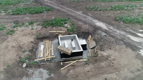 Aerial View of a Structure Built at a Construction Site in the Field