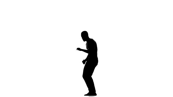 Afro American Man with Naked Torso Starting Dancing Social Latina Dance on White, Silhouette