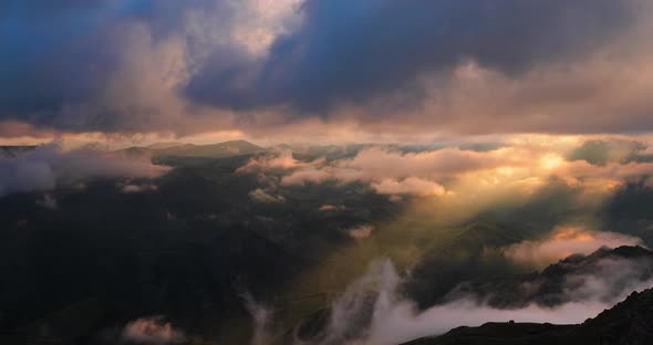 Low Clouds Over a Highland Plateau in the Rays of Sunset