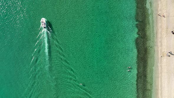 Fishermen fish far out to sea aerial view 4 K