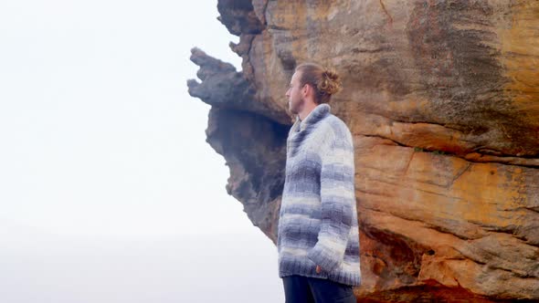 Man standing on a mountain top