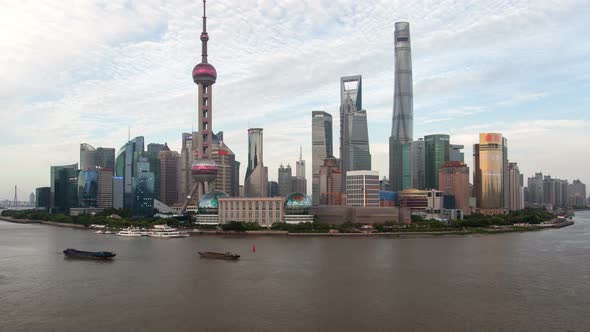 Shanghai River Urban Cityscape Aerial Skyline Panorama Timelapse at Day Zoom Out