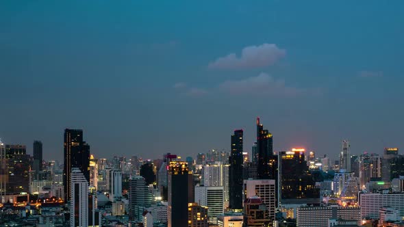 Time lapse night cityscape and high-rise buildings in metropolis city center