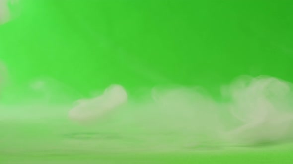 Smoke Rings on Green Chroma Key Background