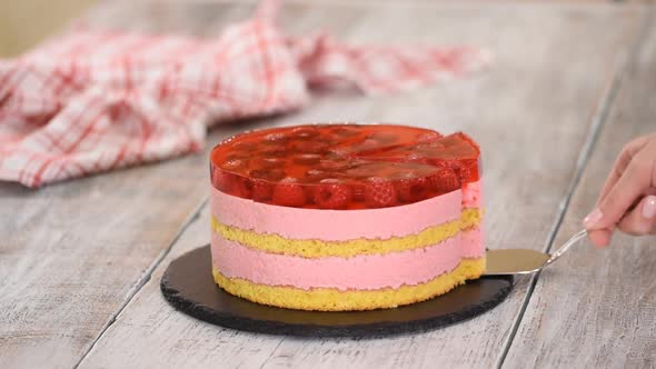 Tasty Sweet Cake with Raspberry Mousse and Layer of Jelly.