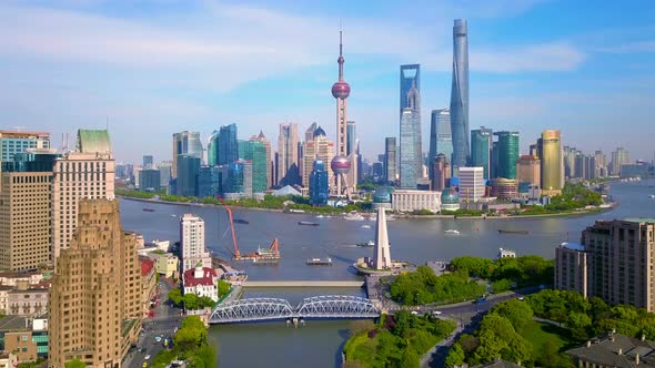 Aerial view of skyscraper and high-rise office buildings in Shanghai, Huangpu River, China.