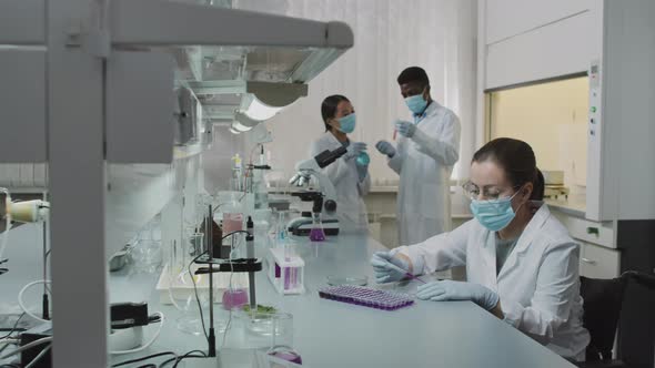 Team of Scientists in Lab