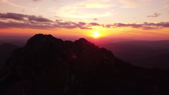 A Beautiful Sunset Over a Rocky Mountain