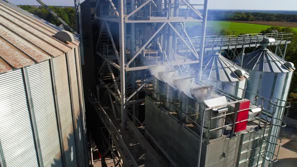 Metal elevator in agriculture zone. Grain Warehouse or depository.