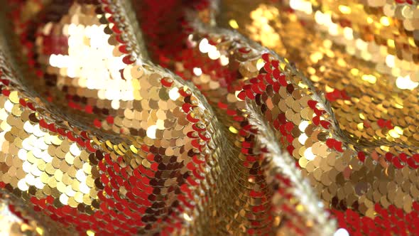 Gold and red beautiful shiny sequins and bokeh