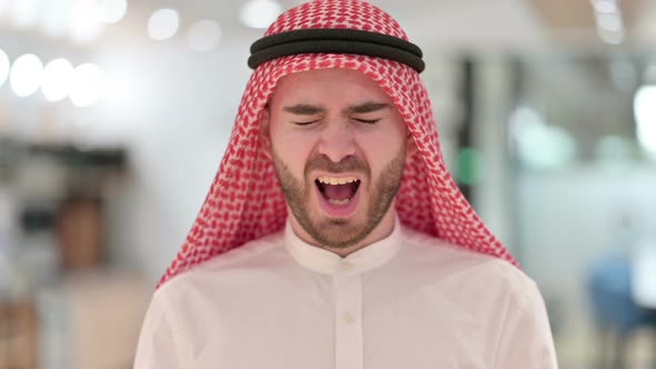 Portrait of Upset Arab Businessman Shouting, Screaming 