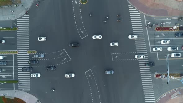 Aerial Drone Shot of Crossroad in the City Cars and Buses Driving By Avenue