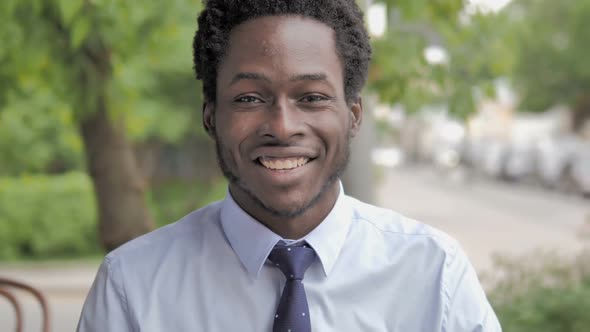 Outdoor Close Up of Serious African Businessman