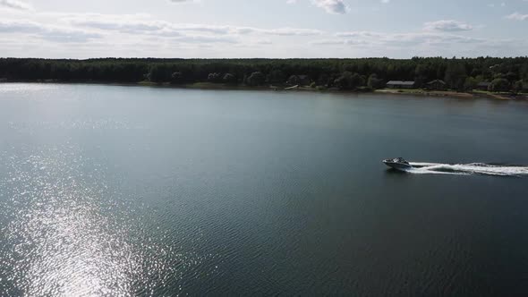 Speedboat Quickly Floats on the Water Surface