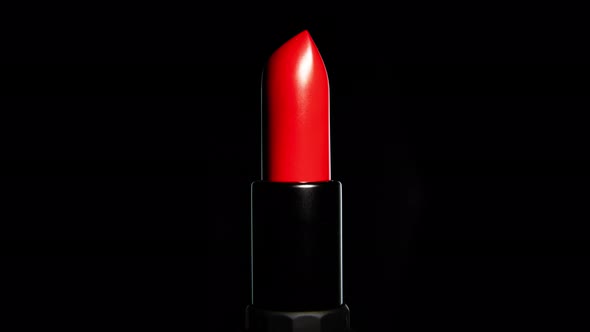 Video of a Red Lipstick Rotating in Studio