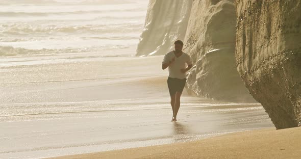 Footage of a Runner During Workout Among Beautiful Natural Landscape